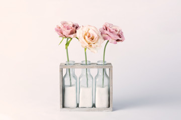 Flower composition in a wooden frame