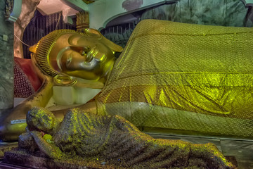 Wat Tham Khao Yoi is a beautiful temple adjacent to the rocky mountains of Phetchaburi Province in...