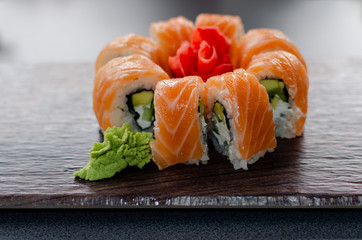 rolls and sushi on a light background, tasty food at home