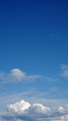 Blue sky with clouds background
