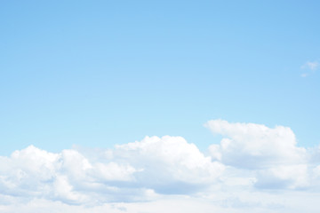 Blue sky with clouds background