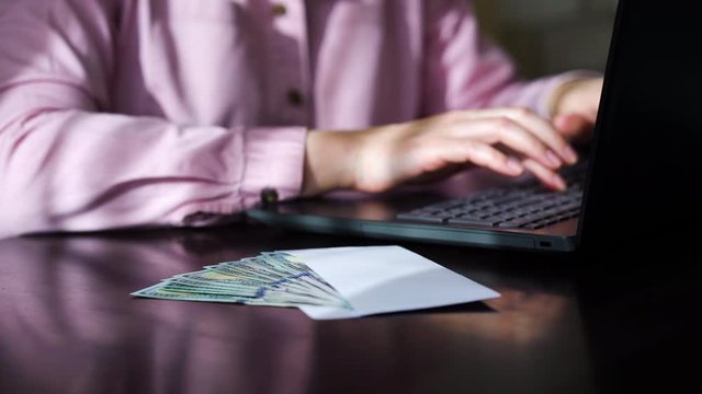 Crop office girl receiving cash for good job