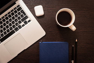 Notebook, pen, pencil and notebook on the table. Remote work.