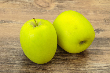 Two ripe green sweet apples