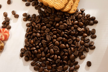 large cookies roasted coffee beans on a white background