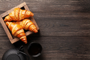Fresh tasty croissants and tea