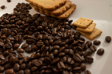 large cookies roasted coffee beans on a white background