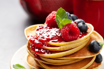Delicious homemade pancakes with summer berries