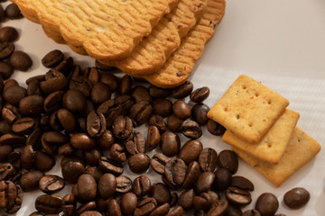 large cookies roasted coffee beans on a white background