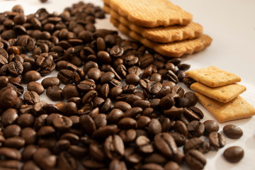 large cookies roasted coffee beans on a white background