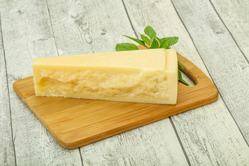 Hard parmesan cheese served basil