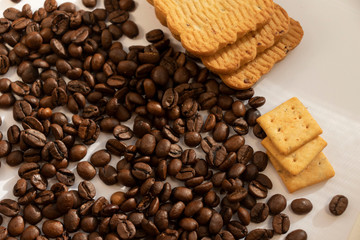 large cookies roasted coffee beans on a white background