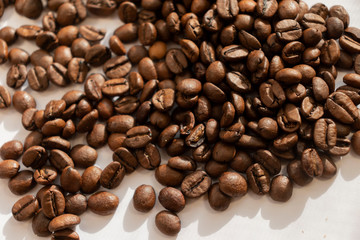 coffee beans a lot of coffee scattered on a white background