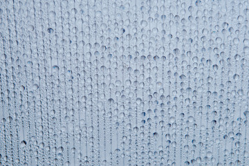 abstract background of water drops on transparent surface