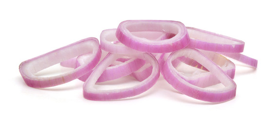 Sliced red onion on white background
