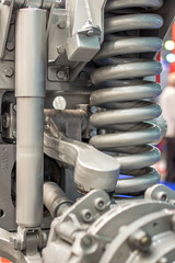 shock absorber spring and suspension on the chassis of car truck wheel