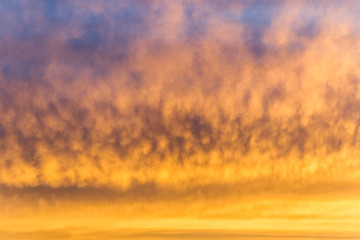 Splendid sunset with red glowing evening clouds
