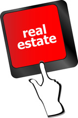 Real Estate concept. hot key on computer keyboard with Real Estate words