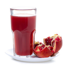 Glass of pomegranate juice and fresh pomegranate on white background isolation