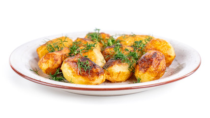 Fried fresh potatos and dill on a plate isolated on a white background