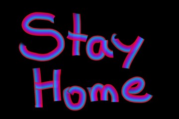 Stay Home hand written text isolated on a black Background