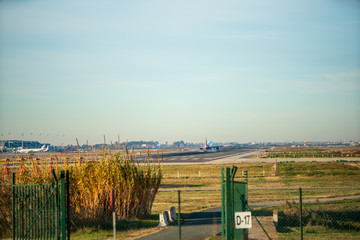 BARCELONA, CATALUNYA, SPAIN - DECEMBER 13, 2017: Iberia company plane landing at El Prat airport, Barcelona.