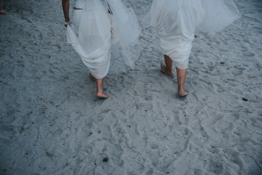 Lesbian Wedding Walking On The Beach