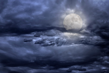 Naklejka na ściany i meble Full moon in a cloudy night