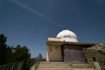 Castelltallat astronomical observatory near Barcelona. Stars on a full moon night.
