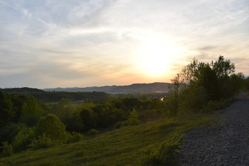 Naklejka na ściany i meble sunset over the hills