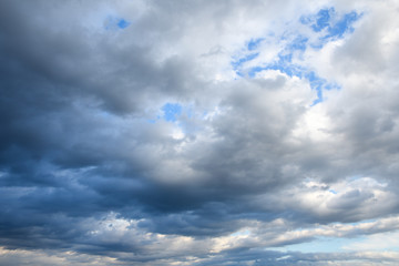 Stormy sky with storm clouns on the sunset with beautiful sun