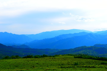 landscape with mountains and clouds