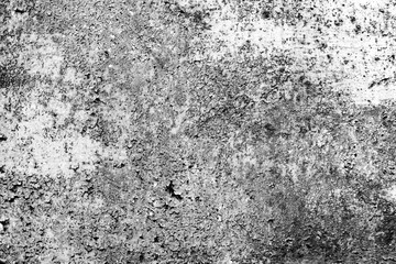 Texture of a concrete wall with cracks and scratches which can be used as a background