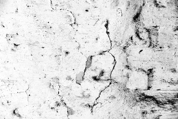 Texture of a concrete wall with cracks and scratches which can be used as a background