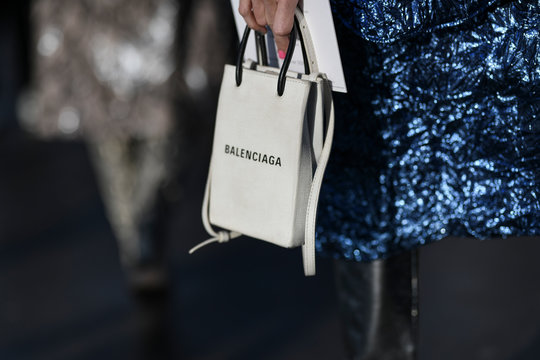 Paris, France - February 27, 2020: White patterned Balenciaga handbag - streetstylefw20