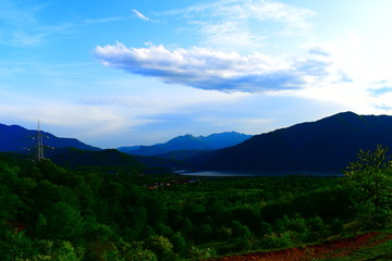 Naklejka premium mountain landscape with clouds