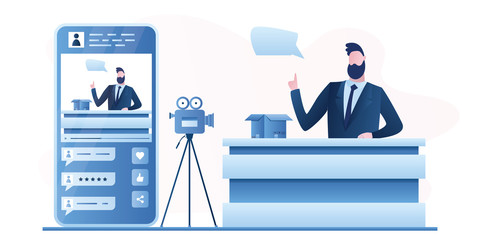 Handsome man blogger create video content. Unboxing video, product review. Male vlogger on workplace, camera on tripod.