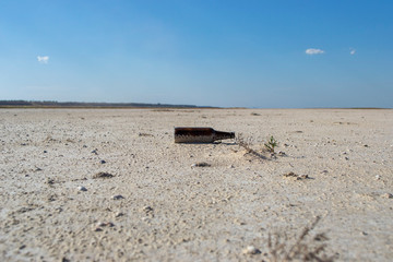 debris at the bottom of the dried estuary