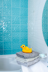 yellow duck in the bathroom, interior details on the bathtub