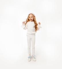  girl with long hair, dressed in white clothes, bounces up