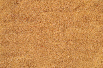 yellow sand from a city beach