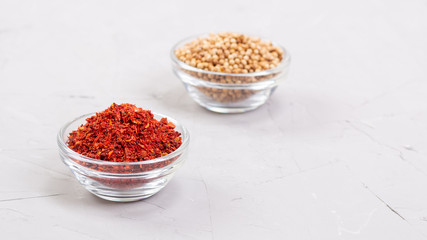 Moroccan spice Harissa and coriander in a glass plates