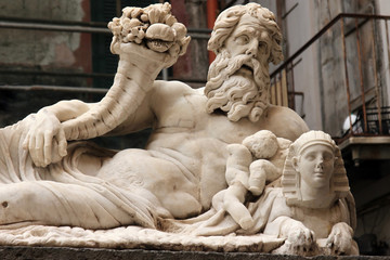 Naklejka premium The Statue of the Nile God (Statua del dio Nilo) is an Ancient Roman, likely Hellenistic, marble statue dating from the 2nd to 3rd century AD, Naples, Italy.