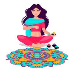 an Indian woman sits and makes rangoli from powders, chalk, marble dust, rice flour. The traditional picture of happiness on holiday Diwali