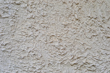 a fragment of gray plastered wall