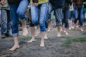 A group of people running barefoot on a holiday