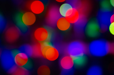 abstract background of blurred warm lights with cool blue and purple background with bokeh effect