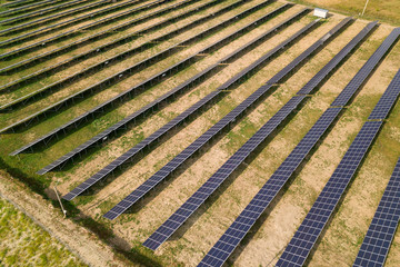 Aerial view of solar power plant. Electric panels for producing clean ecologic energy.