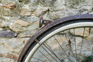 vintage bicycle on a brick background, old style, 60s 70s