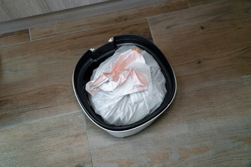 Top view of a bin with a plastic bag